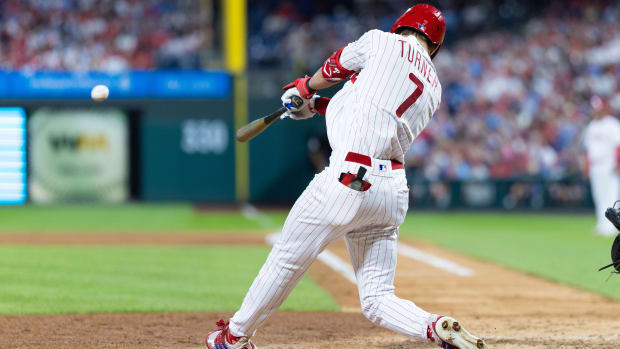 Sep 11, 2023; Philadelphia, Pennsylvania, USA; Philadelphia Phillies shortstop Trea Turner (7) hits an RBI double during the fourth inning against the Atlanta Braves at Citizens Bank Park. Mandatory Credit: Bill Streicher-USA TODAY Sports